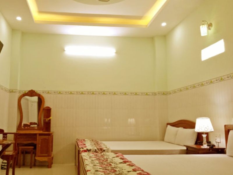 Giường ngủ tại Khách sạn Gia Hưng